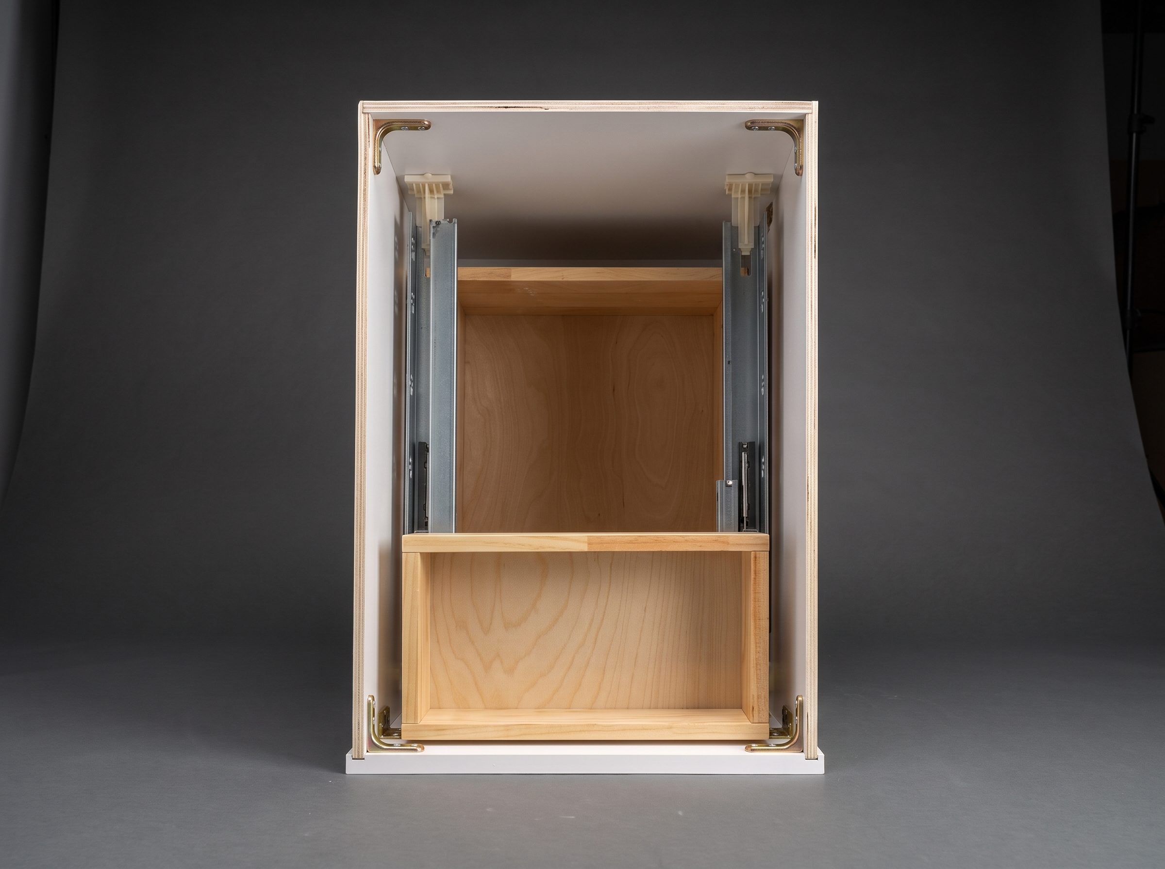 Illustrative construction plate of an open white shaker base cabinet