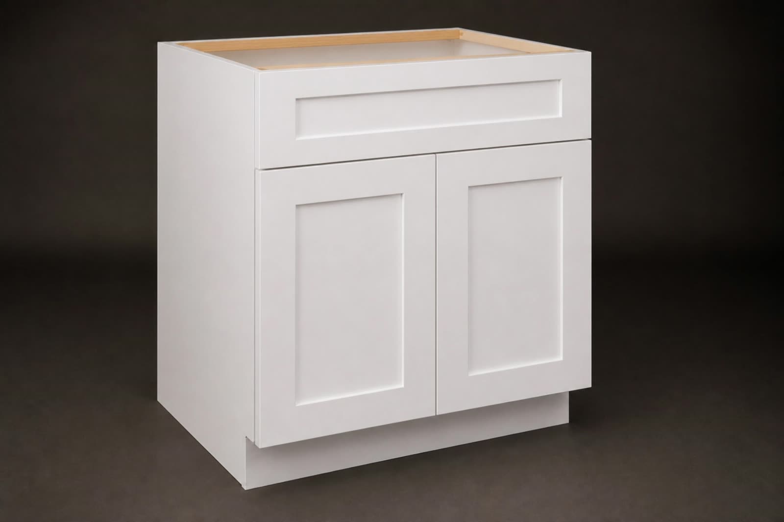 Shaker base cabinet assembling from an open construction view — study, not a named install